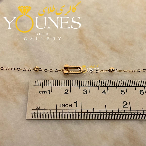 دستبند تیفانی و گوی طلا